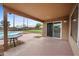 Relaxing backyard patio with a sliding glass door that views the spacious yard and in ground pool at 665 S Balboa --, Mesa, AZ 85206