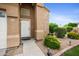 Inviting front entrance featuring well-maintained landscaping and a cozy walkway at 665 S Balboa --, Mesa, AZ 85206