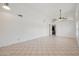Bright living room offers neutral tones, tile flooring and lots of natural light at 665 S Balboa --, Mesa, AZ 85206