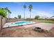 Private in-ground pool surrounded by palm trees and well maintained landscaping perfect for relaxing at 665 S Balboa --, Mesa, AZ 85206