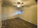 Bedroom with wood-look flooring, ceiling fan, and window at 6729 N 16Th St # 21, Phoenix, AZ 85016