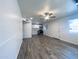 Clean, updated kitchen with stainless appliances, white cabinets, and modern wood-look flooring at 6729 N 16Th St # 21, Phoenix, AZ 85016