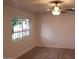 Bright living room with a ceiling fan and a large window view at 6729 N 16Th St # 21, Phoenix, AZ 85016