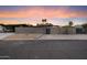 Contemporary home featuring a block wall, privacy gate, xeriscaping, and stunning mountain views at 7026 E Pasadena Ave, Paradise Valley, AZ 85253