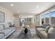 Inviting living room with an open floor plan, hardwood flooring, and bright, airy lighting at 7026 E Pasadena Ave, Paradise Valley, AZ 85253