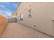 Low-maintenance backyard area featuring gravel and block fencing at 820 E Agua Fria Ln, Avondale, AZ 85323