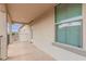 A covered balcony provides a view of the neighborhood at 820 E Agua Fria Ln, Avondale, AZ 85323