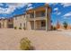 Charming two-story home with a balcony and low-maintenance landscaping at 820 E Agua Fria Ln, Avondale, AZ 85323