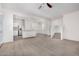 Bright living room with open floor plan and staircase at 820 E Agua Fria Ln, Avondale, AZ 85323