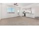 Bright living room with open floor plan and kitchen access at 820 E Agua Fria Ln, Avondale, AZ 85323
