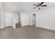 Bright living room with open floor plan and staircase at 820 E Agua Fria Ln, Avondale, AZ 85323