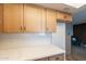 Beautiful kitchen with stylish cabinets, modern countertops, and view to the living area at 8309 E Rose Ln, Scottsdale, AZ 85250