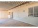 Spacious covered patio with access to the backyard at 8309 E Rose Ln, Scottsdale, AZ 85250