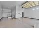 Spacious garage with high ceilings and ample storage space at 8325 W Cantera Ave, Peoria, AZ 85383