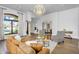 Spacious living room with hardwood floors, natural lighting, and elegant architectural features at 8325 W Cantera Ave, Peoria, AZ 85383