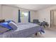 Cozy bedroom featuring a large bed, soft lighting, and a relaxing seating area, creating a serene and comfortable retreat at 8540 N 43Rd Dr, Glendale, AZ 85302