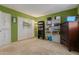 Bedroom featuring bare floors, open shelving, and ample natural light at 8540 N 43Rd Dr, Glendale, AZ 85302
