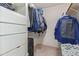 Walk-in closet with installed shelving and ample room for storage at 8540 N 43Rd Dr, Glendale, AZ 85302