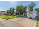 Charming single story home featuring mature trees, a lawn, and a convenient attached two car garage at 8540 N 43Rd Dr, Glendale, AZ 85302