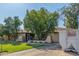 Charming single story home featuring mature trees, a lawn, and a convenient attached two car garage at 8540 N 43Rd Dr, Glendale, AZ 85302