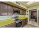 Modern kitchen equipped with stainless steel appliances and plenty of cabinet space for organized and convenient cooking at 8540 N 43Rd Dr, Glendale, AZ 85302