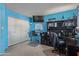 Home office with carpet and functional layout, with blue accent wall at 8540 N 43Rd Dr, Glendale, AZ 85302