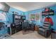 Home office with carpet and functional layout, with blue accent wall at 8540 N 43Rd Dr, Glendale, AZ 85302