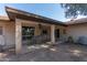 Covered outdoor patio overlooking the backyard at 8540 N 43Rd Dr, Glendale, AZ 85302