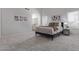 Bright bedroom featuring soft carpet, light walls, windows, and stylish decor for a peaceful atmosphere at 8569 W Voltaire Ave, Peoria, AZ 85381