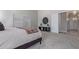 Cozy bedroom featuring soft carpet, light walls, window, and decorative elements for a comfortable retreat at 8569 W Voltaire Ave, Peoria, AZ 85381