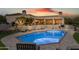 Stunning backyard showcasing a pool, desert landscaping, and multiple seating areas for outdoor relaxation at 9301 E Via Montoya --, Scottsdale, AZ 85255