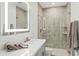 Beautiful bathroom with white countertops, an LED mirror, and a glass shower with gray tile at 9301 E Via Montoya --, Scottsdale, AZ 85255