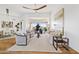 Bright living room featuring stylish furniture, a grand piano, and scenic views at 9301 E Via Montoya --, Scottsdale, AZ 85255