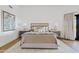 Serene main bedroom featuring a neutral color palette, side tables, and a cozy area rug at 9301 E Via Montoya --, Scottsdale, AZ 85255