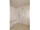 A modern glass enclosed shower with a stone floor, and a marble bench at 9301 E Via Montoya --, Scottsdale, AZ 85255