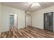 Neutral bedroom featuring wood-look floors and ensuite bathroom at 9455 E Raintree Dr # 1025, Scottsdale, AZ 85260