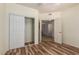 Bedroom featuring wood-look floors and walk-in closet at 9455 E Raintree Dr # 1025, Scottsdale, AZ 85260