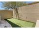 Private putting green in the backyard, perfect for practicing your golf game at 10415 E Rosemary Ln, Scottsdale, AZ 85255