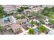 Aerial view of a community park with playground, shade structures, walking paths, and desert landscaping among tile-roofed homes at 1069 S Nancy Ln, Gilbert, AZ 85296