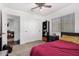Bedroom features a closet, ceiling fan and carpet at 11580 N 145Th Ave, Surprise, AZ 85379