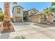 Charming two-story home featuring desert landscaping, and an attached two-car garage at 11580 N 145Th Ave, Surprise, AZ 85379