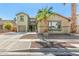 Charming two-story home featuring desert landscaping, and an attached two-car garage at 11580 N 145Th Ave, Surprise, AZ 85379