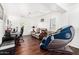 Spacious living room with hardwood floors, lots of light, and comfortable furnishings at 11580 N 145Th Ave, Surprise, AZ 85379