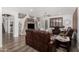Bright living room boasts stone fireplace, recessed lighting, and a ceiling fan at 11580 N 145Th Ave, Surprise, AZ 85379
