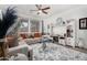 Bright living room featuring neutral furniture, modern decor, and ample natural light at 11580 N 145Th Ave, Surprise, AZ 85379