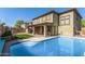 A refreshing pool takes center stage, complemented by a well-maintained yard for outdoor enjoyment at 11580 N 145Th Ave, Surprise, AZ 85379