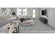 The neutral living room features bright furniture, offering a peaceful ambiance for entertaining at 11657 N Siders Ln, Maricopa, AZ 85139