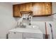 Organized laundry room with a modern washer and dryer at 15841 N 23Rd Pl, Phoenix, AZ 85022