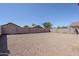 Spacious backyard with privacy wall at 16077 W Larkspur Dr, Goodyear, AZ 85338