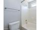 Bathroom features a toilet, shower head, and combined shower and bathtub at 16077 W Larkspur Dr, Goodyear, AZ 85338